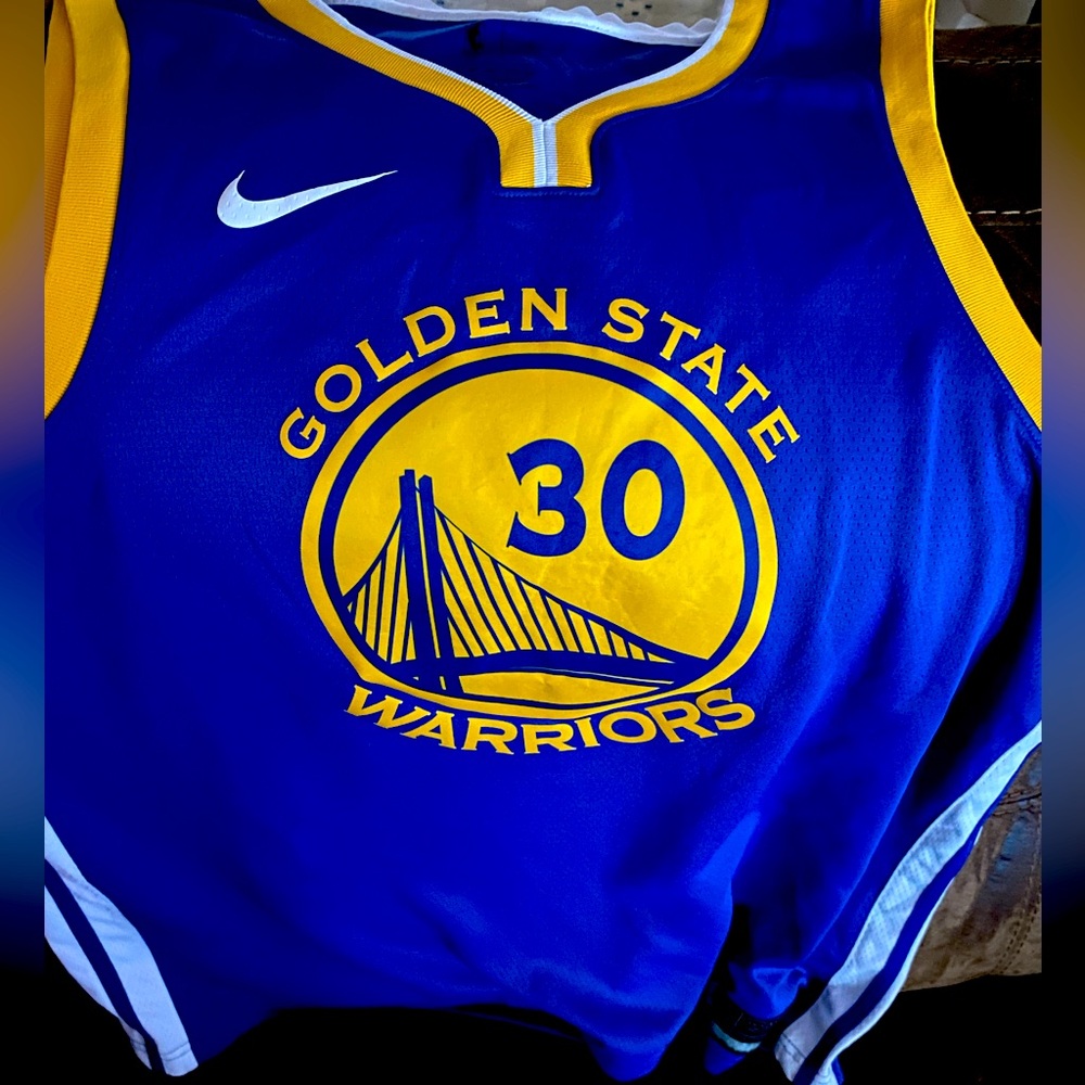 Curry Golden State Basketball jersey.
